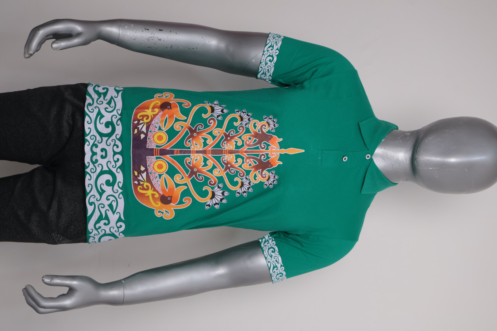 Polo Dayak Batang Garing Berkah Ellanor Combed 24s Tosca (Pendek)