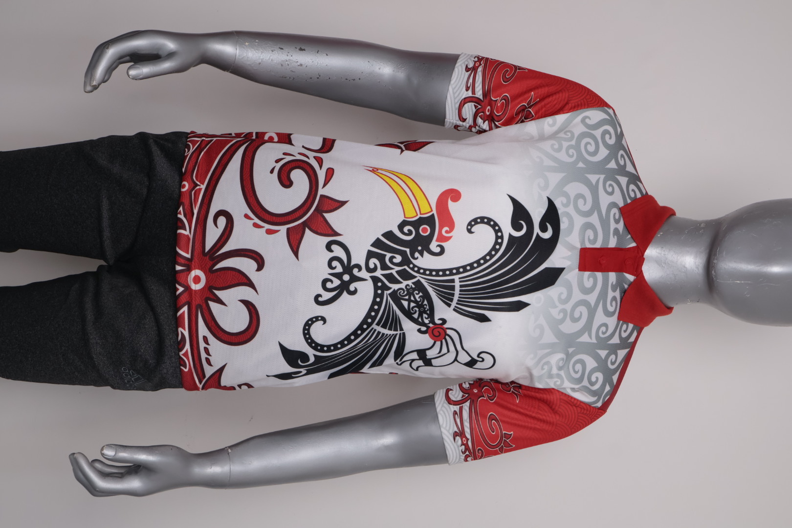 Polo Jersey Dayak Tingang Terawang Kreasi Brazil Putih Merah (Pendek)