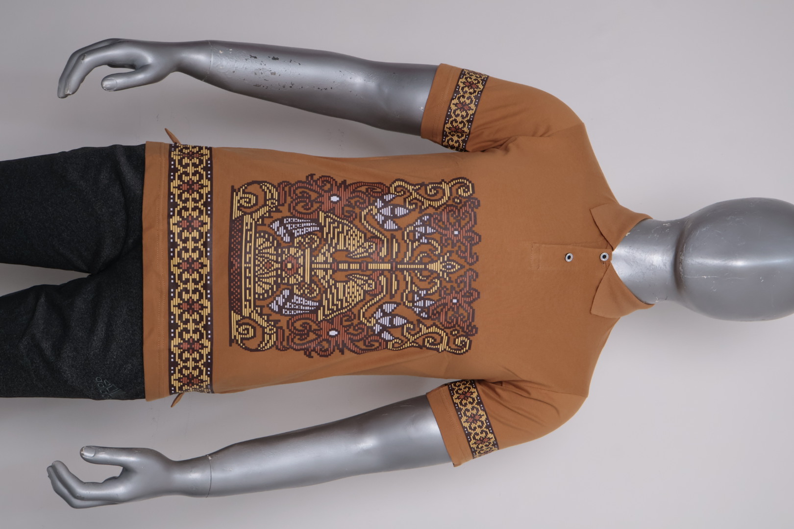 Polo Dayak Batang Garing Tikar Ellanor Combed 24s Almond Brown (Pendek)